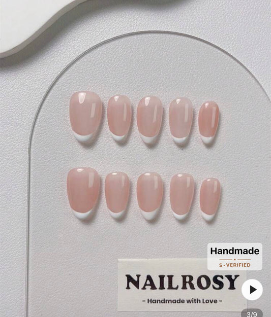 Handmade french tip press on nails.
