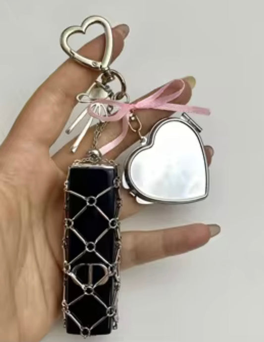 Lip balm holder & mirror bag charm.