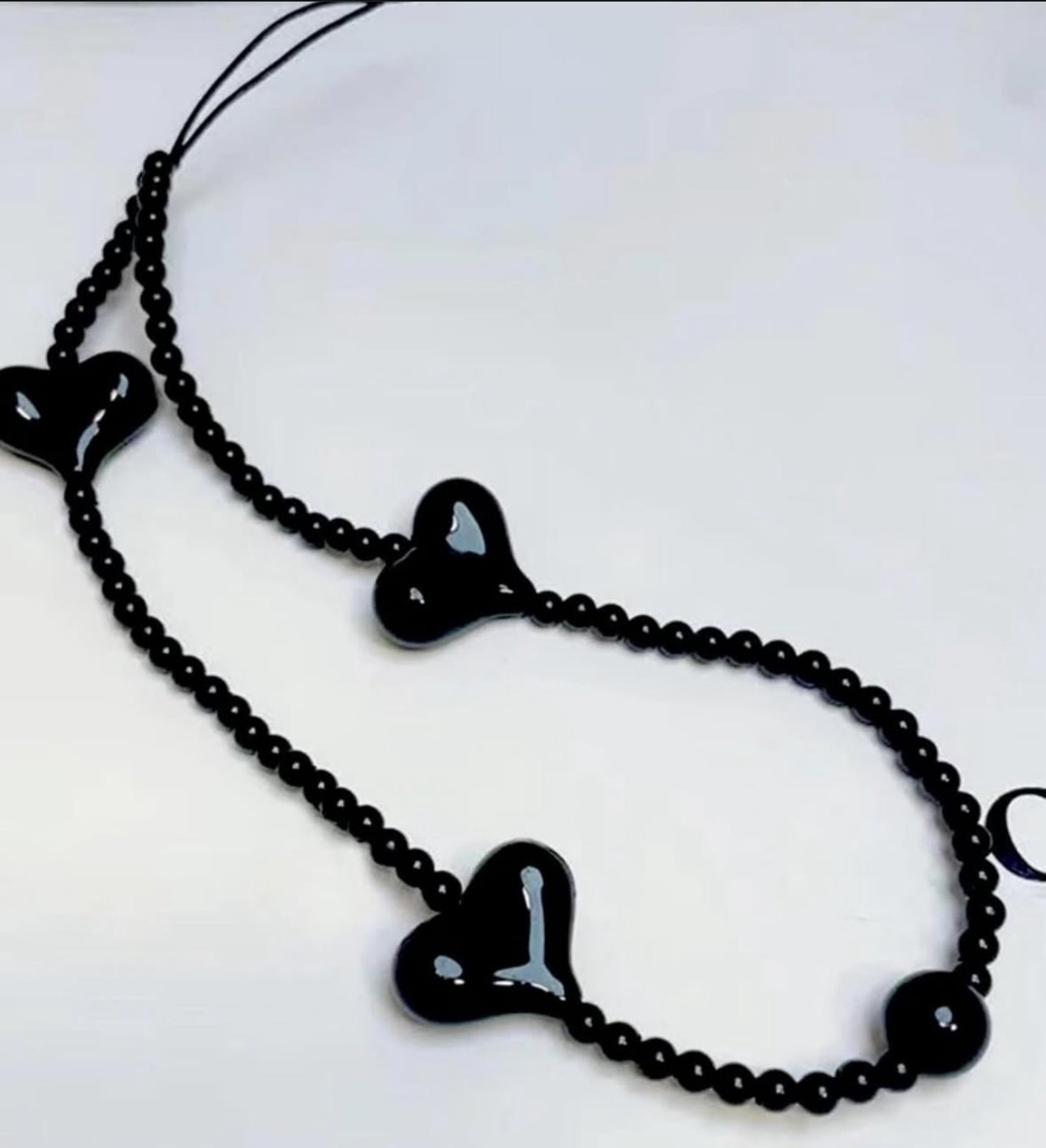 ÓNIX HEART PHONE CHARM.