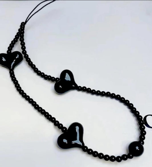ÓNIX HEART PHONE CHARM.