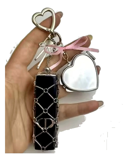 Lip balm holder & mirror bag charm.