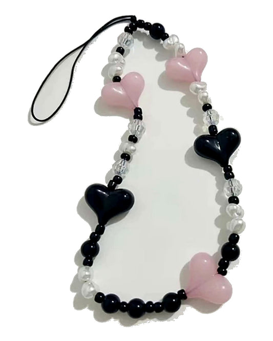 Neopink heart phone charm.
